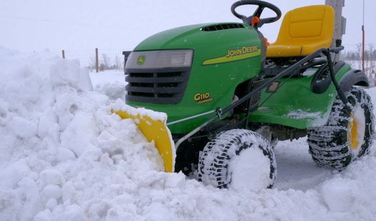 How Do I Plow Snow with a Lawn Tractor